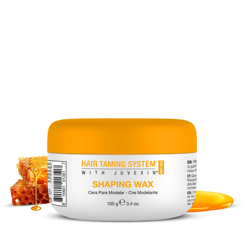 GK Hair Shaping Wax 100 g white jar with an orange lid beside honeycomb and dripping honey on white