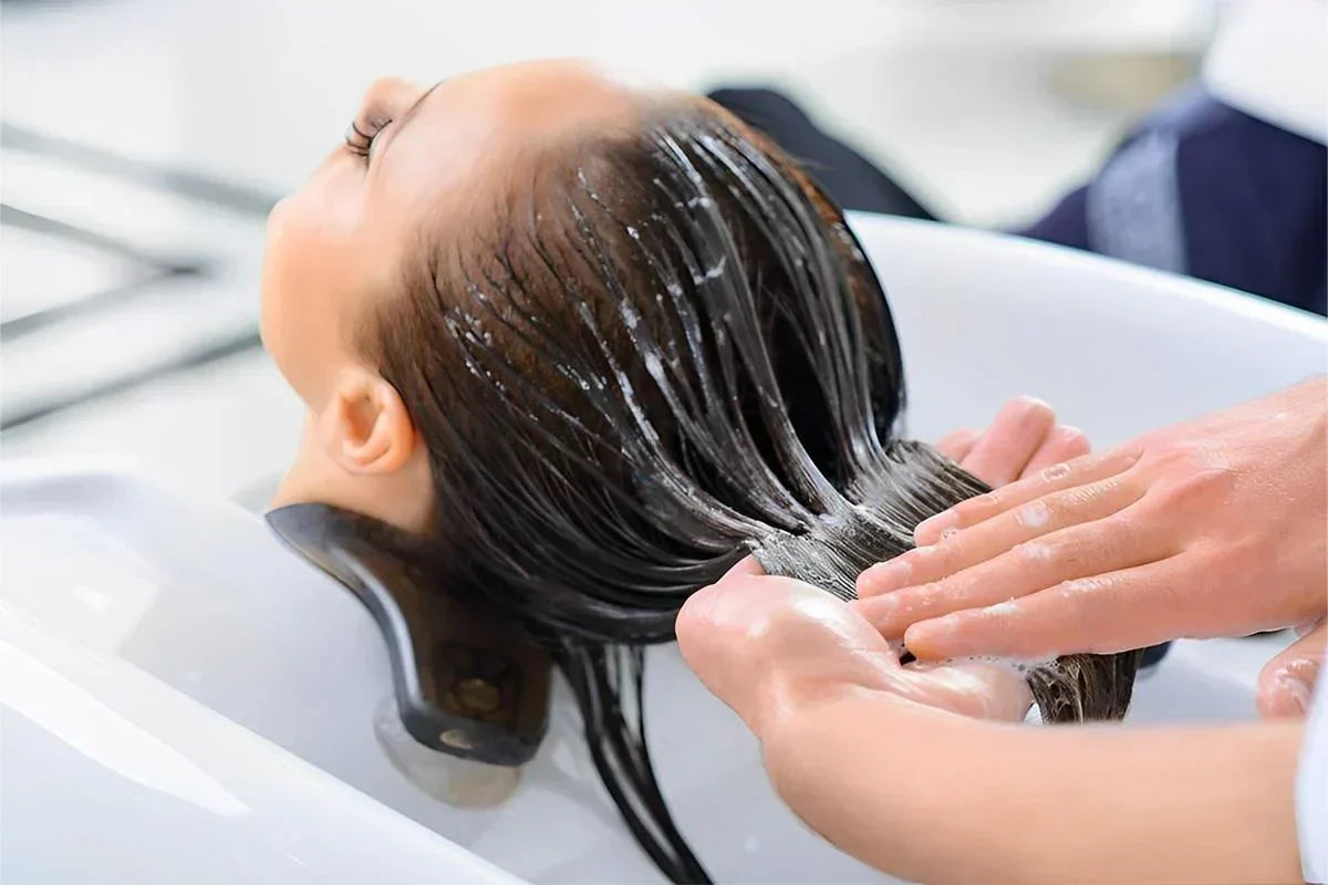 A Lady her hair washed in the salon