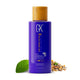 GK Hair Hot Bombshell Masque 3.4 fl. oz. / 100 ml violet bottle with a gold cap, a dewy leaf and mixed seeds beside it