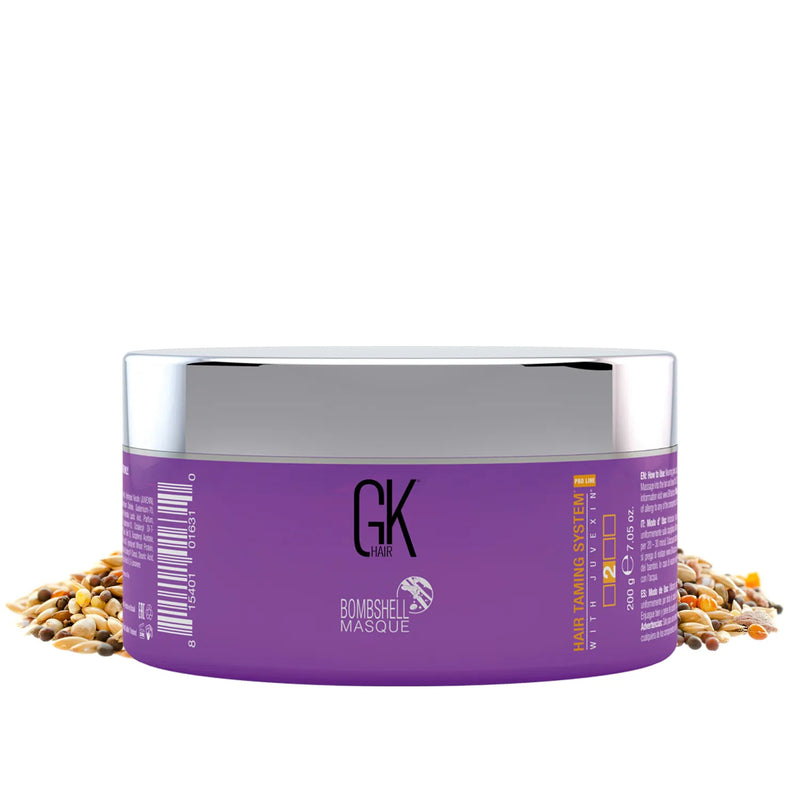 GK Hair Ultra Blonde Bombshell Masque 200 g purple jar with a silver lid, standing in mixed grains and seeds
